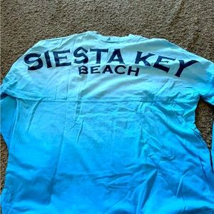 Siesta Keys long sleeve tshirt fades from light blue to a darker blue size large